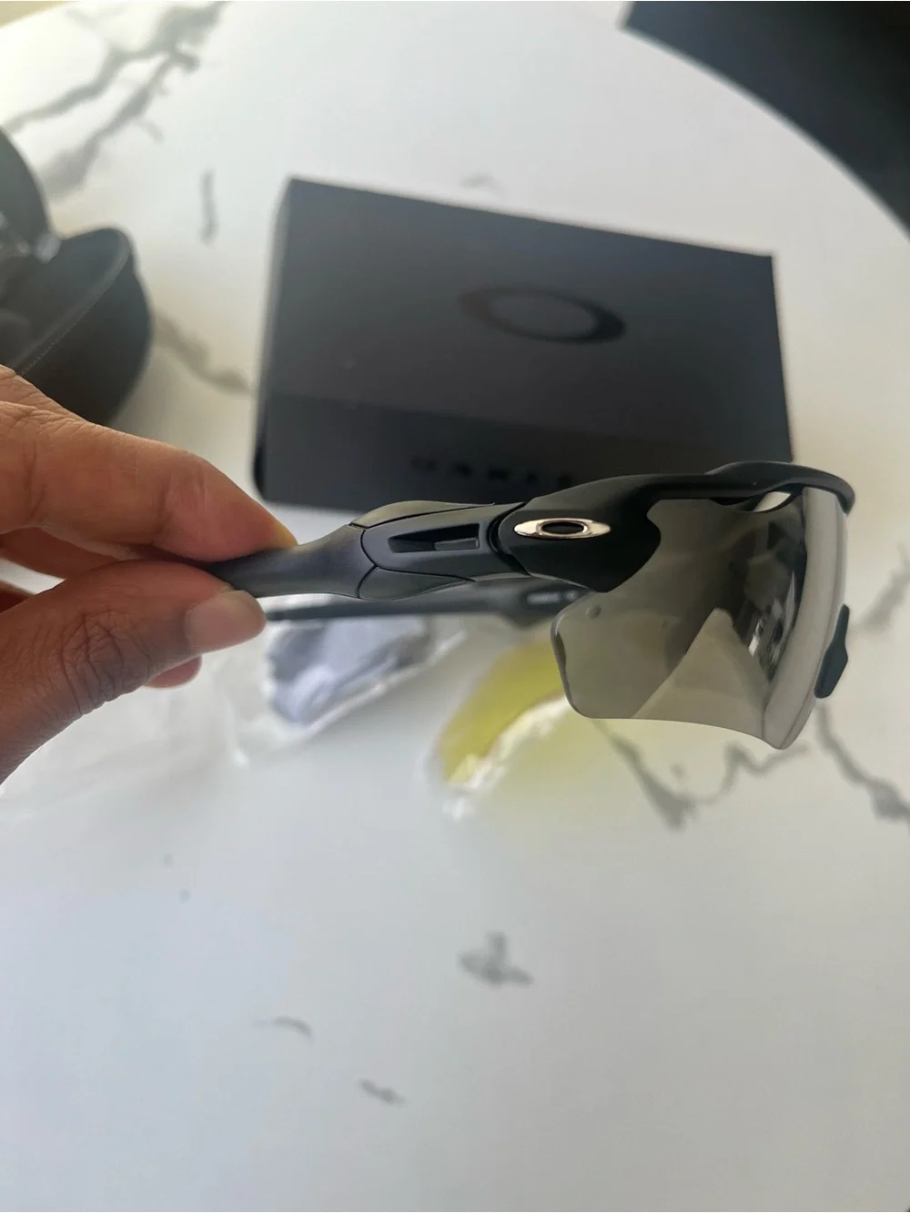 Oakley Black Frame Sunglasses with Silver Mirror Lens